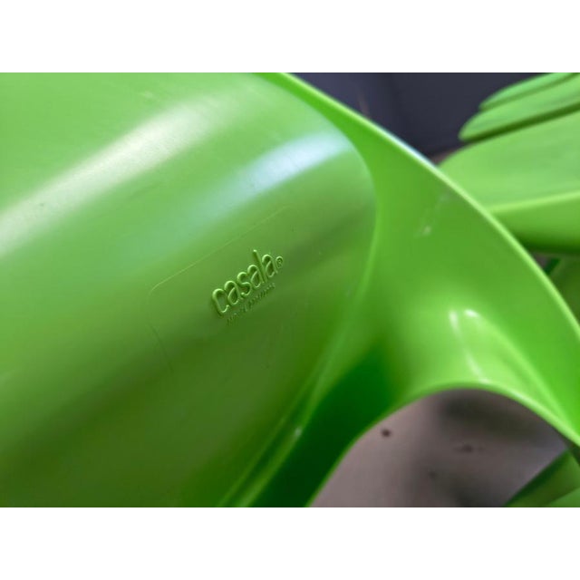 Set of 4 space age era dining chairs designed by Alexander Begge for Casala. Made from moulded plastic with beautiful...