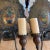 Lovely pair of Bell Co. of California double arm metal wall sconces with painted cornucopia/still life designs to wall...