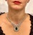 Approximately 11 Ct Pear Shape Zambian Natural Emerald & approximately 17 Ct Diamond Necklace 18 Karat White Gold This...