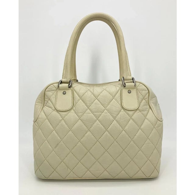 Cream Chanel Paris New York Cream Distressed Bowling Tote For Sale - Image 8 of 12