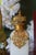 An exceptional 19th-century French perfume bottle crafted in luminous white opaline and set within an extraordinarily...