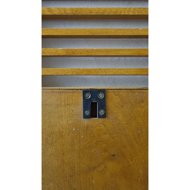 Rare mirror designed by Ettore Sottsass for Santambrogio & De Berti, 1962. Cross-planked wooden structure. , mirrored...