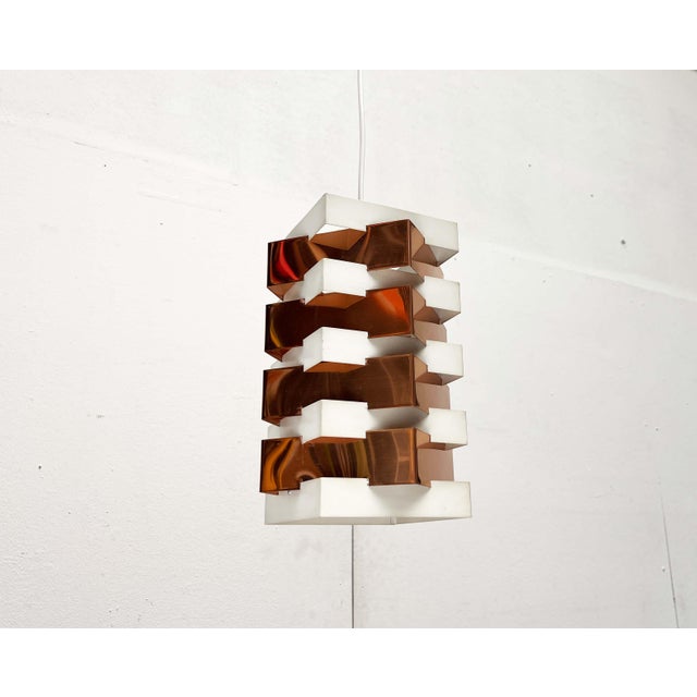 Rare pendant lamp by Anvia, designed by the Dutch designer J.J.M. Hoogervorst in the 1960s. The lamp impresses with its...