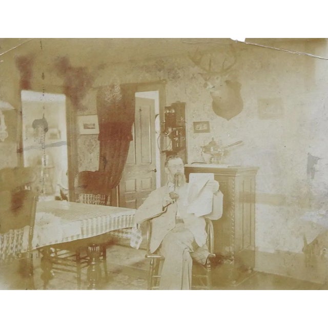 Antique Photograph Interior, Telephone, Deer Mount & Pipe Smoking Man For Sale
