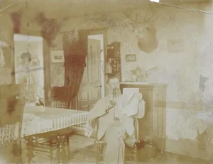 Antique Photograph Interior, Telephone, Deer Mount & Pipe Smoking Man