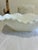 This charming set of 8 milk glass bowls showcases a pressed quilted diamond pattern with a soft, ruffled scalloped edge on...