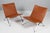 Poul Kjærholm lounge chair new upholstered with cognac full grain aniline leather. Frame of brushed steel. Model PK22,...