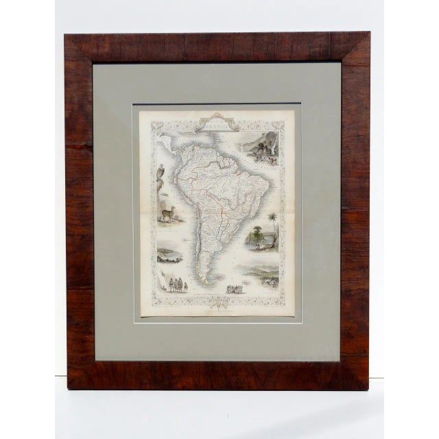 South America calls! An original engraving published by John Tallis in 1851. This map features decorative vignettes of...