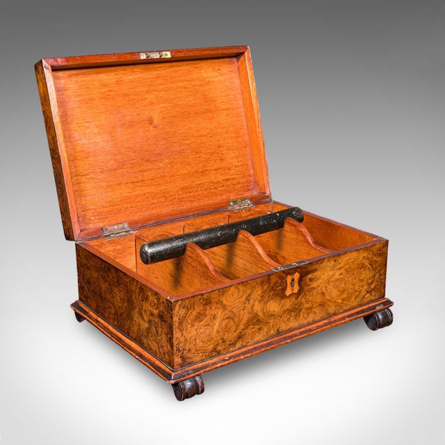 This is an antique keepsake case. An English, burr walnut jewellery or organiser box, dating to the late Victorian period...