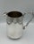 Elegant early 20th-century silver plate creamer jug made by Sheridan silver in Taunton. This piece is characterized by its...