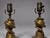 Pair of decorative table lamps in the Continental Empire Revival taste, early 20th century, maker unidentified. Cast and...