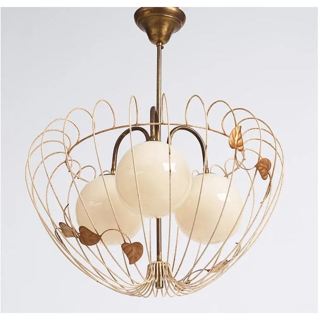 Swedish Modern style ceiling lamp design attributed to Hans Bergström, Sweden, circa 1940. Metal cage shaped shade with...