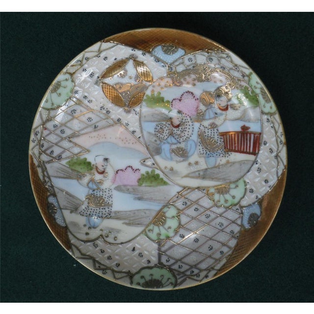 This Antique Japanese Satsuma Figurine Saucer Plate is a Antique piece hand-painted with a multicolor Asian design. The...