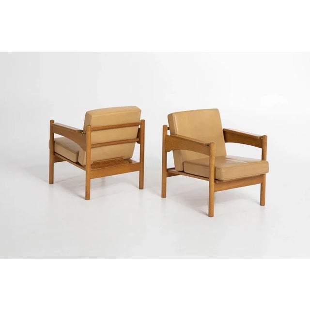 Beautiful pair of oak and leather armchairs by ULUV Krasna Jizba, Czechoslovakia, 1960s. Great original condition with...