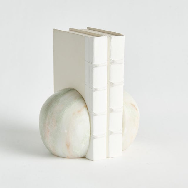 This lovely pair of marble bookends are perfect for displaying your treasured books in the entry foyer, but versatile...