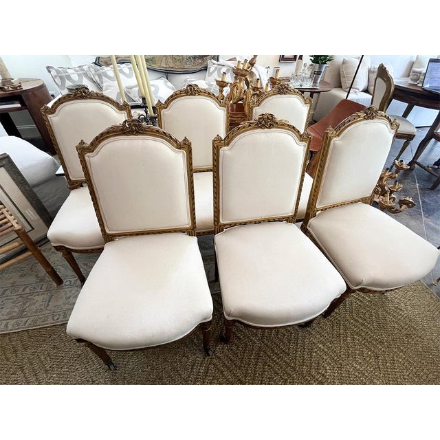This stunning set of 6 dining chairs is sturdy and in great condition. The chairs have two casters each.