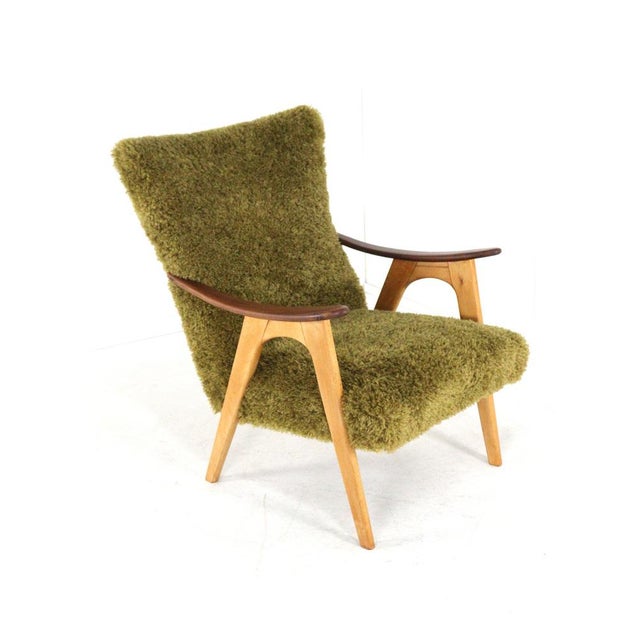 An exclusive, funky armchair—one of a kind in the world! Discover the perfect blend of vintage design and modern comfort...