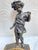 One of a kind bronze figurine on hand painted wood base. I believe it to be of Italian origin given the style of the base....
