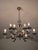 A radiant chandelier made of polished white brass. The chandelier is also suitable for a larger room. Six double arms. The...