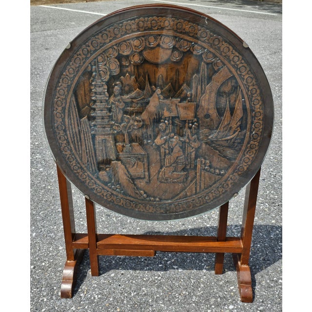 Beautiful hand-carved Chinese Carved Hardwood And Glass Tilt-Top Tea Table or Side Table Measures 24" in diameter, 22" in...