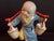 This colorful figure harkens to traditional stories about young monks carrying water. The crackle finish lends an air of...