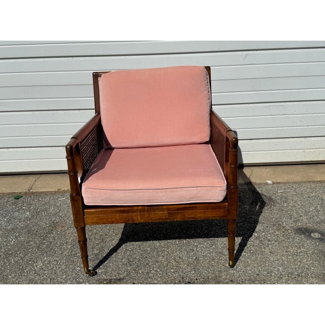 Mid-Century Regency Lounge Chair Offered is a Mid-Century Regency Lounge Chair. This chair feature the awood trim in a...