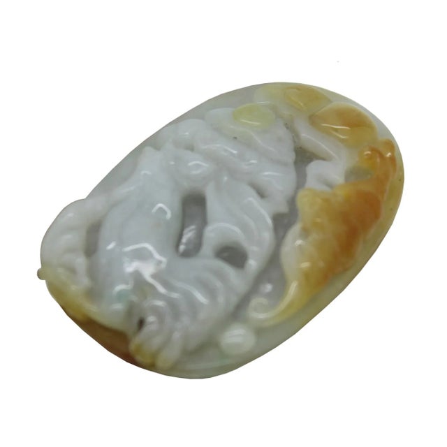 This rooster figure pendant is carved from natural untreated green and yellow jade. Rooster is a fortune lucky statue in...