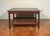 Mid-Century Modern solid teak wood square end/side table by DUX made in Sweden from the 1950s 1960's. Features a lower re-...