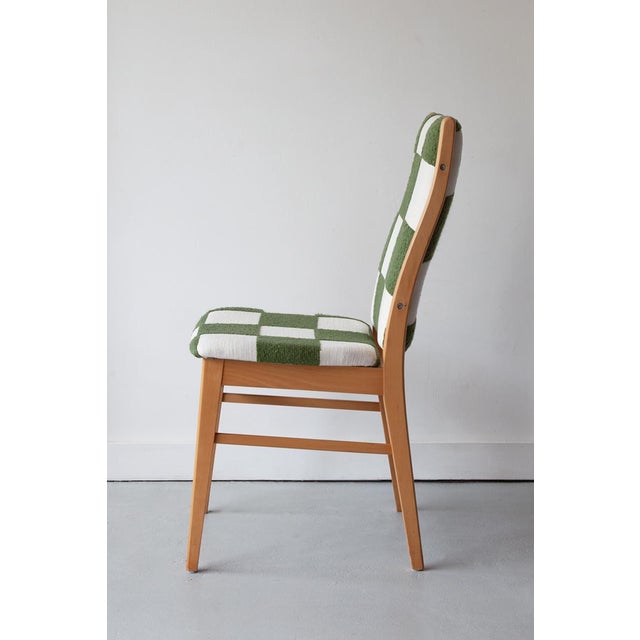An eye catching set of six dining chairs by Farstrup, Denmark. with beech frames and a comfortable stance, these chairs...