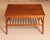 Mid Century rectangular coffee table with a magazine rack, circa 1960s. Excellent fully restored condition. W 77cm D 77cm...
