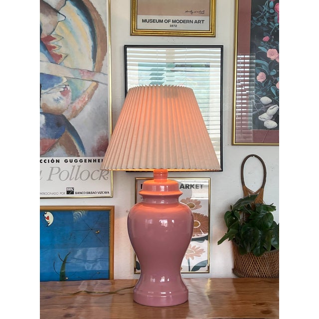 This beautiful vintage pink ginger jar lamp features a classic curvy silhouette and a glossy blush-pink ceramic glaze that...