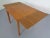 Extendable Danish dining table in teak. Two inset tops. Width 83-149 cm.