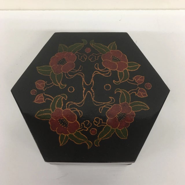 Very cool box from the 60s or 70s by a Lillian Vernon. This gorgeous lacquer box has a lid and is perfect inside to store...
