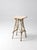 Antique Adirondack twig side table featuring a naturally sculptural branch frame, square plank top, and weathered painted...