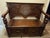 Antique Oak Hall Bench Features Intricate Carvings and a Circular Cane Insert in the Backrest, Late 19th Century For Sale - Image 4 of 9