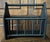 Vintage mid 20th Century wooden spindle style magazine rack. It has a matte black finish perfect for a Primitive or...