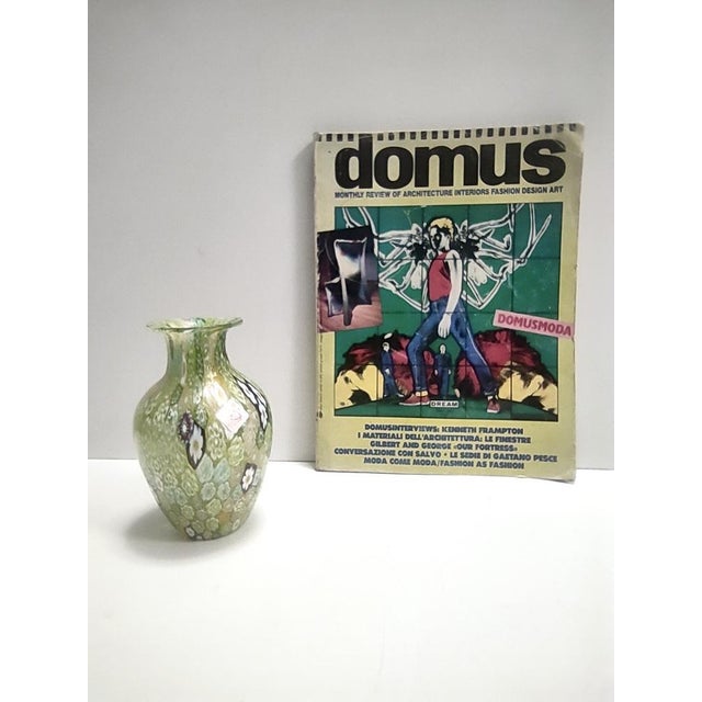 Made in Italy, 1980s. This millefiori vase features different murrines and gold leaf flakes. It has its original label...