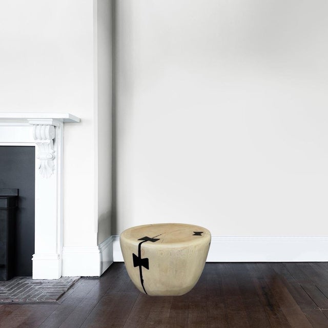 This table (or stool) is carved from reclaimed Ivory Cedar Wood, together with Ebony Bow-Tie Joints by California artist...