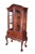 Vintage mahogany curio display case / hutch / cabinet featuring Chippendale styling with a domed top and acanthus accents....