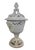 A monumental and architectural Mid-Century Italian white glazed ceramic covered urn, masterfully crafted to bring...