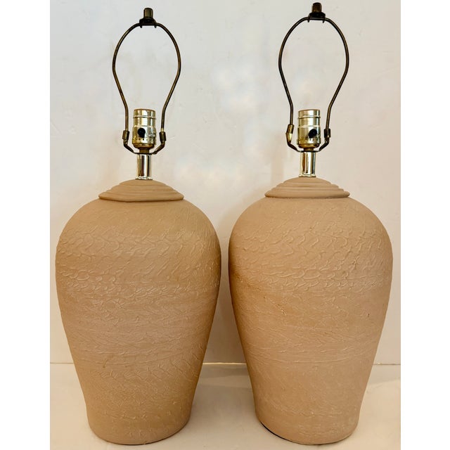 Pair of vintage Organic Modern style plaster table lamps by the brand Elite, numbered, dated and signed '92. They are a...