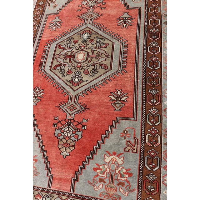 Measures: 4'1 x 7'7. Vintage Turkish Oushak Rug with Coral, Ice Blue, and Soft Mocha Tones. Keivan Woven Arts / rug TU-...