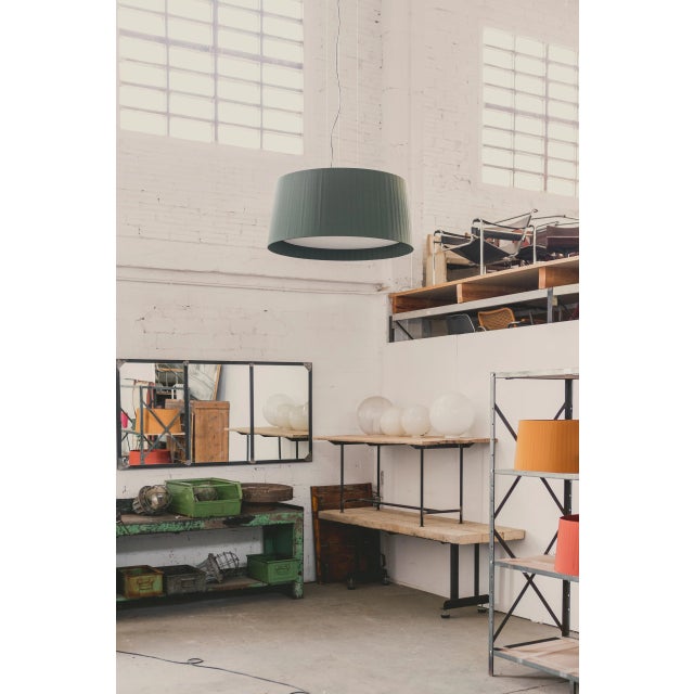 Green gt1000 pendant lamp by santa & cole dimensions: d 100 x h 44 cm materials: metal, ribbon. Available in other colors....