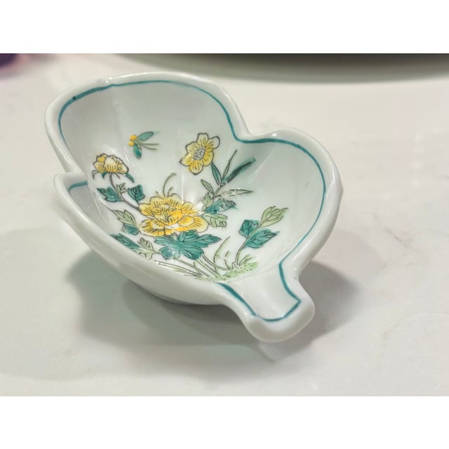 This design of this lovely leaf shaped trinket dish/ashtray is heavily inspired by Qing Dynasty 1644-1911 porcelain,...