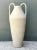 Influenced by ancient Mediterranean vessel forms and striking architectural scale, this 41-inch tall vintage floor vase...