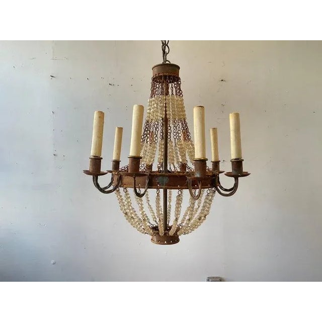 1970s French style rusted metal beaded chandelier.