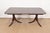 A gorgeous Georgian or Regency style double pedestal extension dining table In the manner of Baker Furniture USA, Mid-20th...
