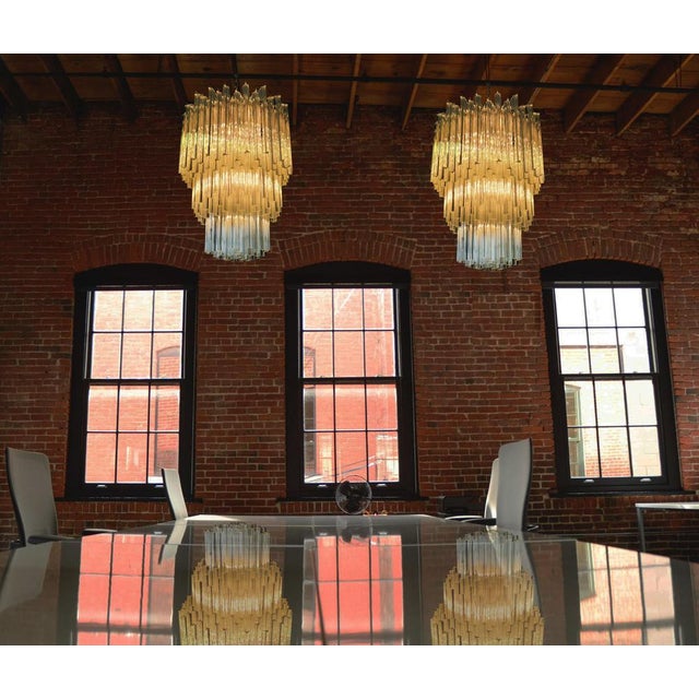 Pair fantastic Murano chandeliers each is made by 184 Murano transparent crystal prism in a nickel metal frame. The...