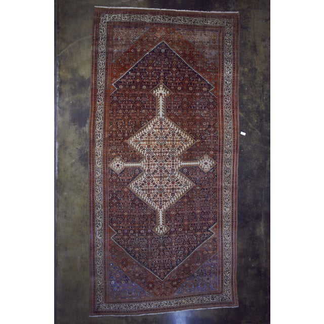 Width: 10 feet Length: 20 feet Color: Blue Age: Antique Materials: Wool Construction: Hand Knotted