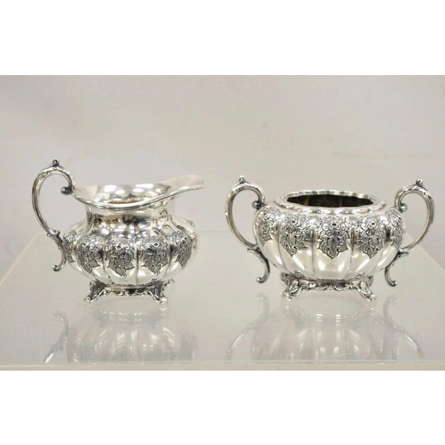 Vintage Victorian 1881 Rogers Canada Silver Plated Sugar Bowl and Creamer Set. Circa Early 20th Century. Measurements:...